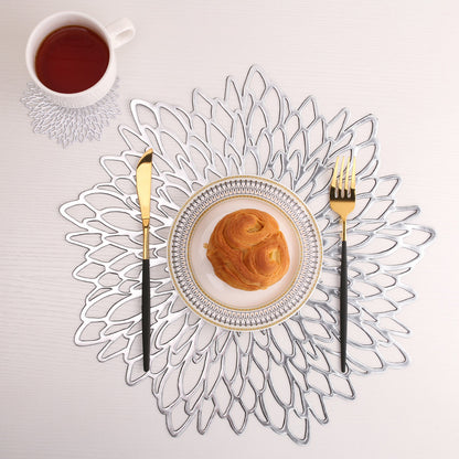 Elegant silver Christmas placemats in a floral design, perfect for festive dining occasions