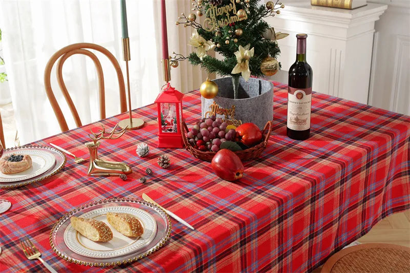 Christmas Plaid Tablecloth displayed on a festive dining table with decorations and food items