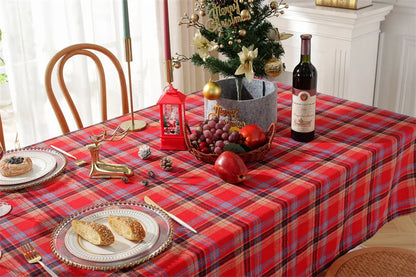 Christmas Plaid Tablecloth displayed on a festive dining table with decorations and food items