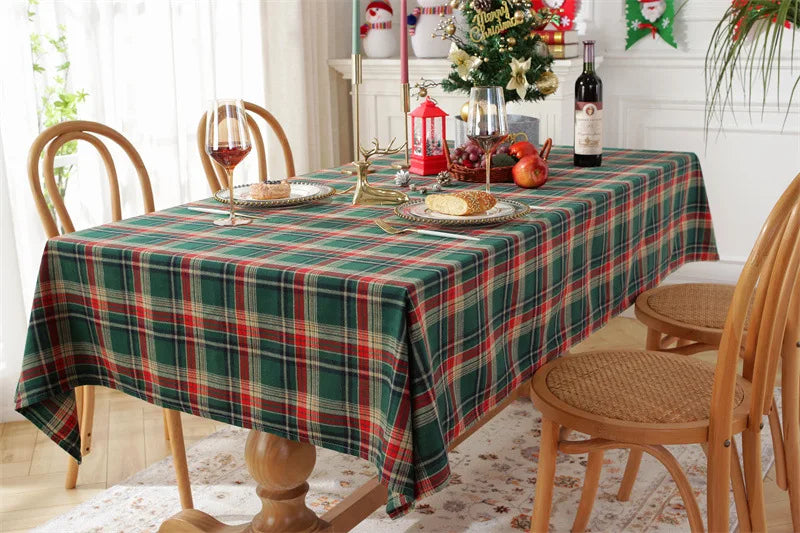 Christmas Plaid Tablecloth on a dining table decorated for a festive holiday meal
