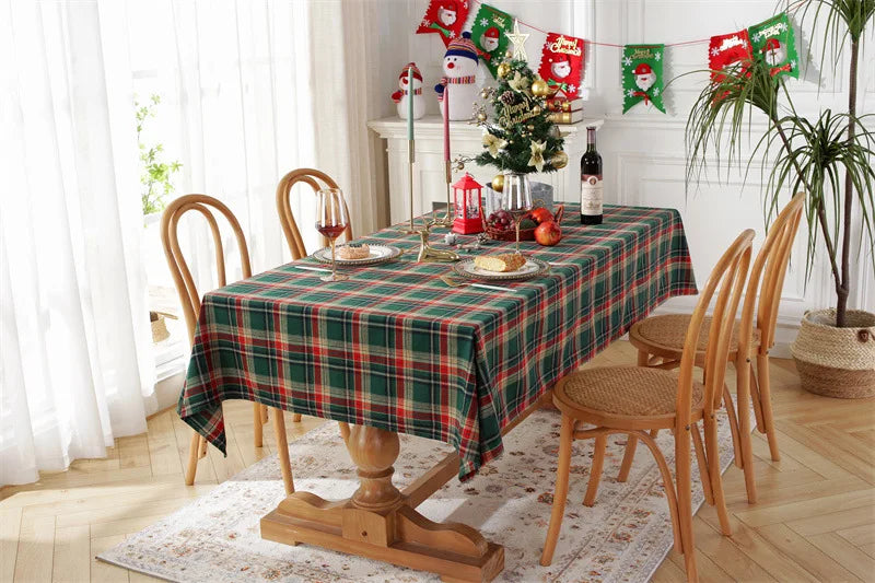 Christmas Plaid Tablecloth on a dining table decorated for a festive holiday gathering