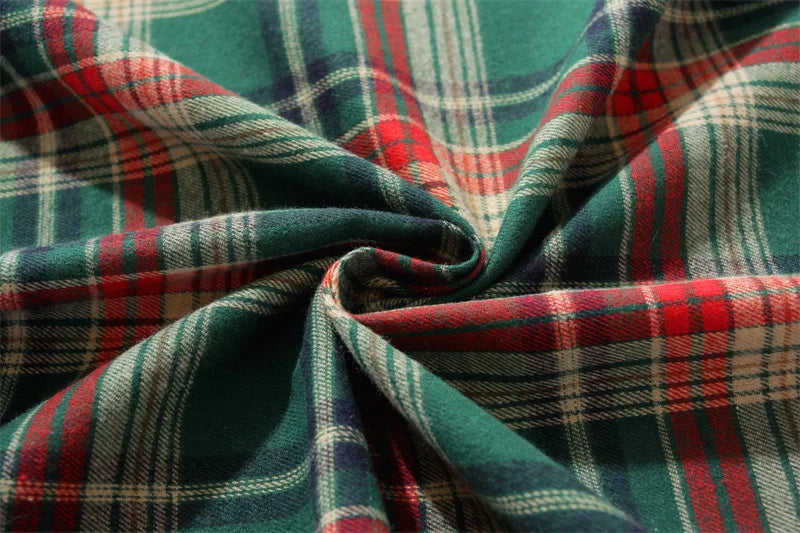Close-up of Christmas Plaid Tablecloth featuring traditional red and green plaid pattern for festive dining