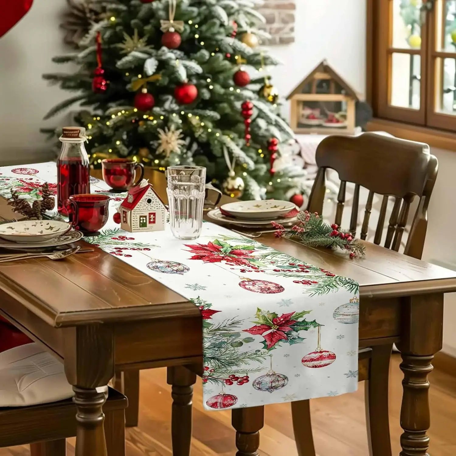 Christmas Poinsettia Linen Table Runner on a holiday dining table with festive decorations