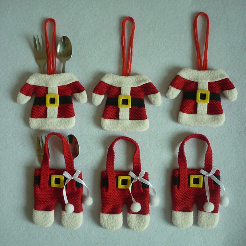 Christmas silverware holders designed as Santa Claus outfits with red and white colors