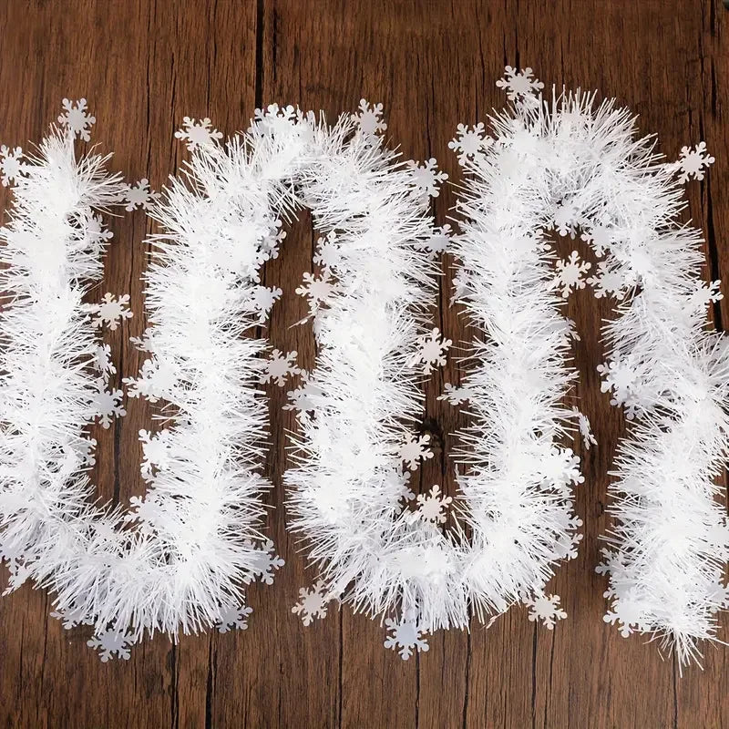 Fluffy Christmas snowflake tinsel garland in white perfect for festive home decorations
