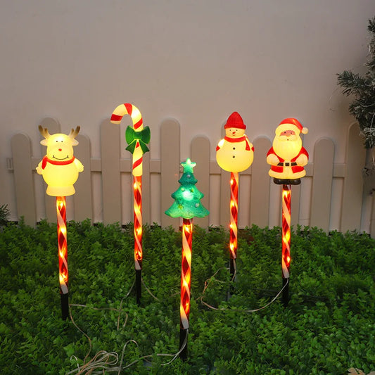 Christmas solar lawn lights set featuring festive characters like Santa, a snowman, and a reindeer