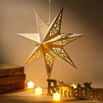 Christmas star paper lantern with intricate cutouts, perfect for holiday decor and festive settings