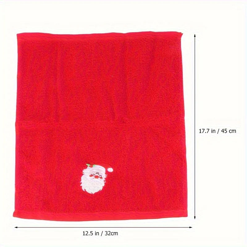 Christmas themed hand towels in red with a cute Santa face design for festive decor