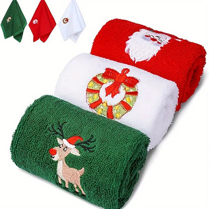 Set of Christmas themed hand towels featuring Santa, a wreath, and a reindeer design in festive colors