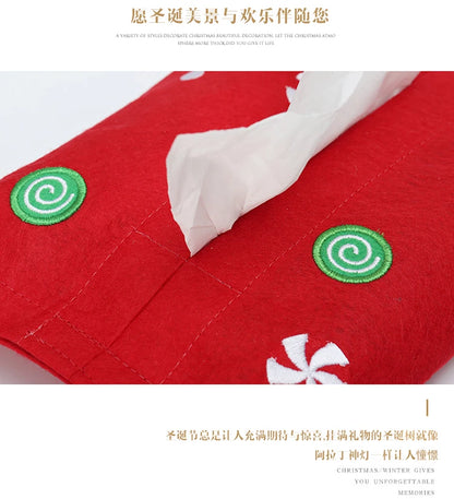 Festive red Christmas tissue box cover with decorative holiday patterns and green accents