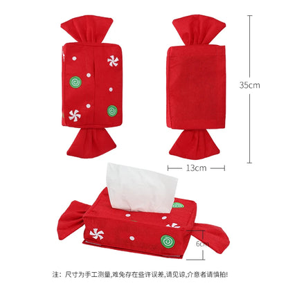 Red Christmas tissue box cover designed like a festive candy with decorative swirls