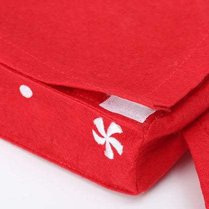 Red Christmas tissue box cover with festive designs perfect for holiday decor
