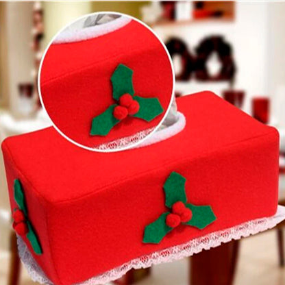 Festive red Christmas tissue box cover featuring holly decorations and lace trim for holiday decor