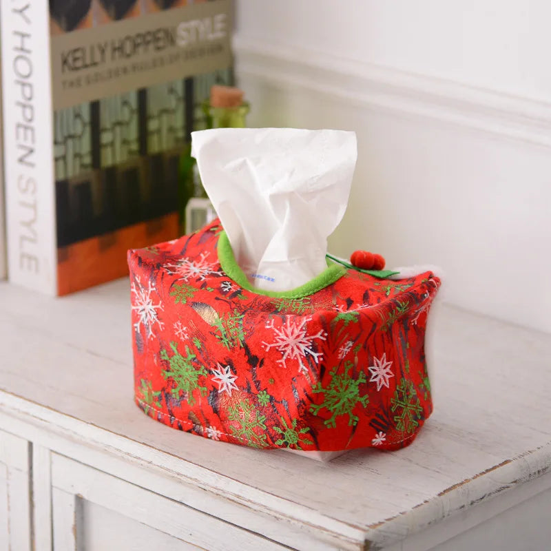 Festive red Christmas tissue box cover featuring winter snowflakes and holly design