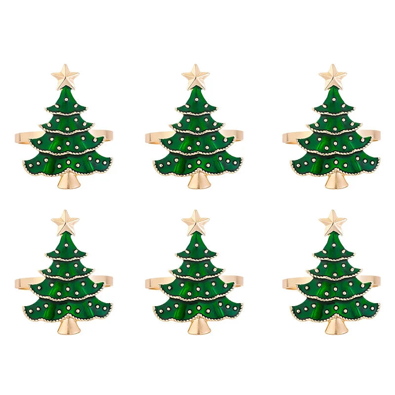 Set of six Christmas tree napkin rings with vibrant green enamel and gold accents for festive table decor
