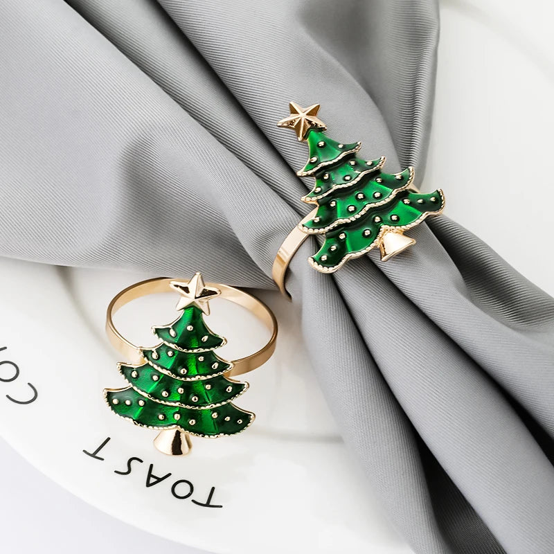Nutshell Christmas tree napkin rings in gold and green, perfect for holiday table settings
