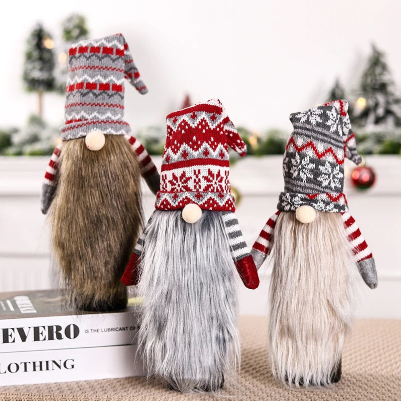 Set of three festive gnome figures wearing Christmas wine bottle covers with hats and beards