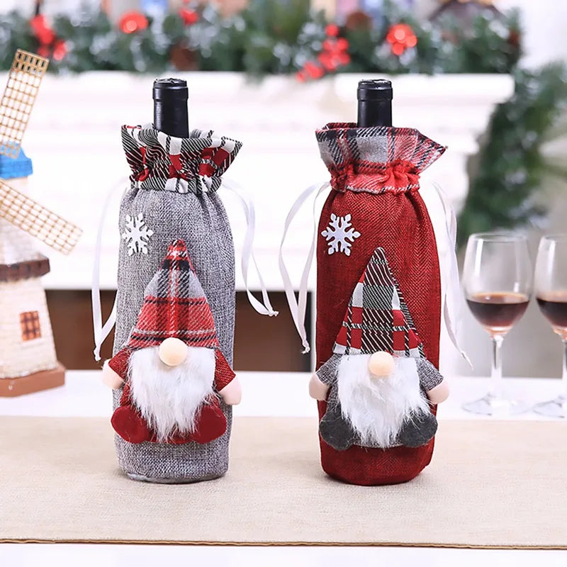 Christmas wine bottle covers featuring gnome designs in gray and red with plaid accents and snowflake details