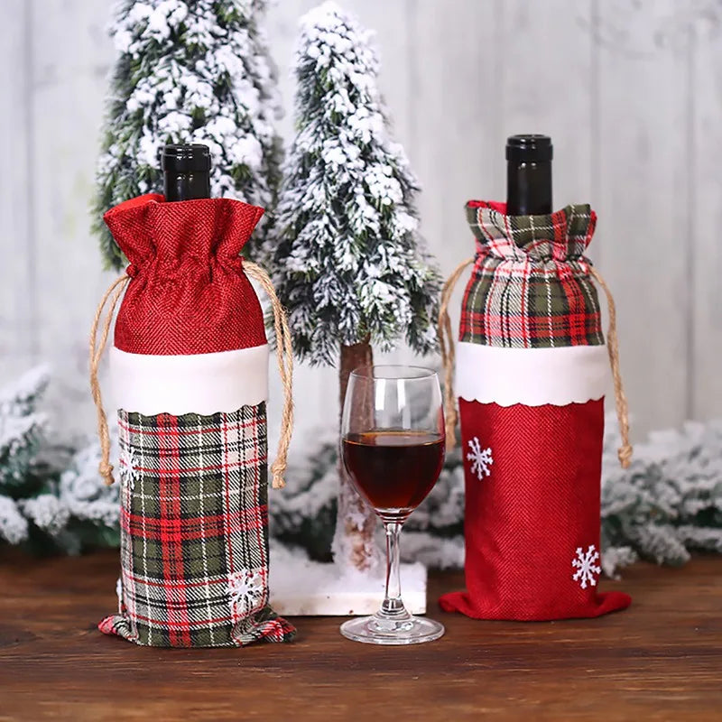 Christmas wine bottle covers in red and plaid designs with drawstring closures for festive gifting