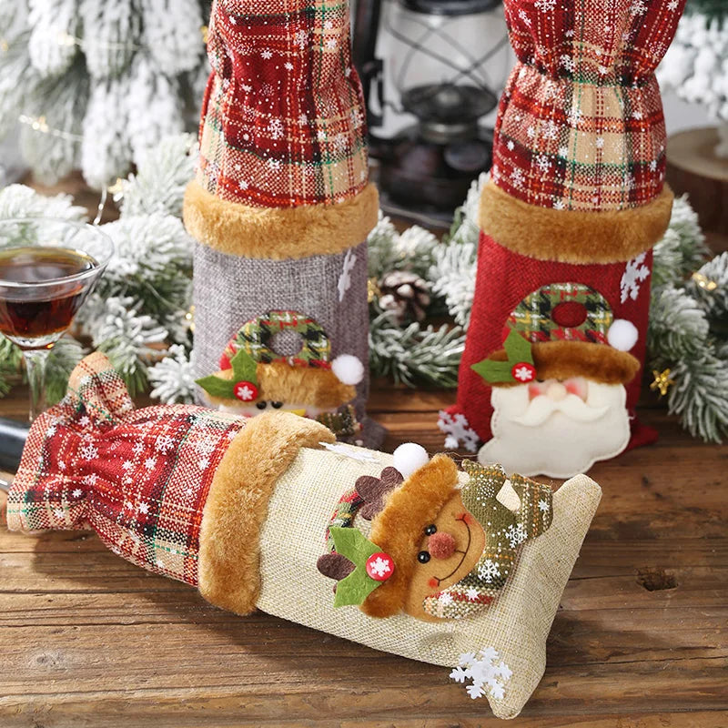 Festive Christmas wine bottle covers featuring Santa, reindeer, and plaid patterns for holiday cheer