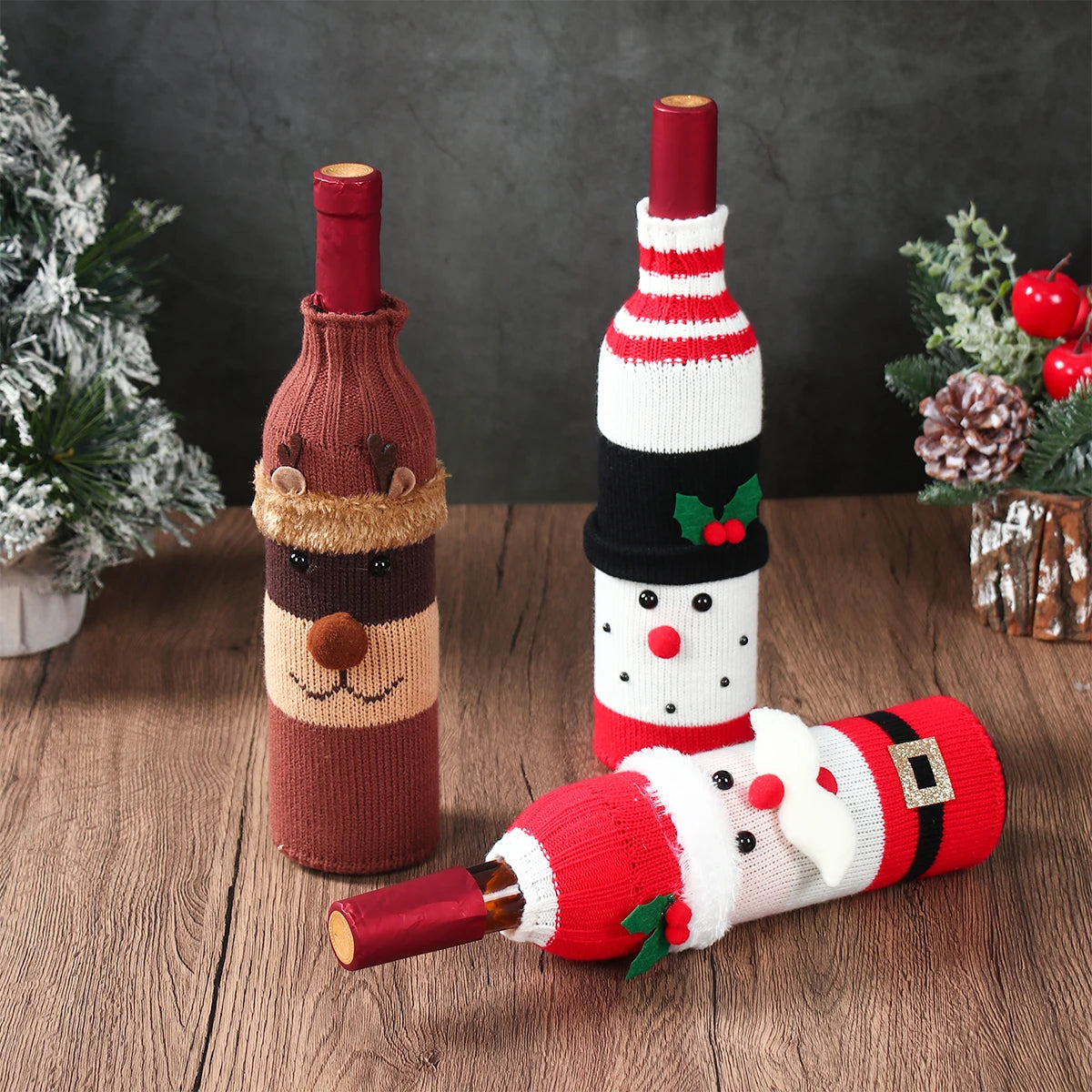 Christmas wine bottle covers set featuring a reindeer, snowman, and Santa design for festive gifting