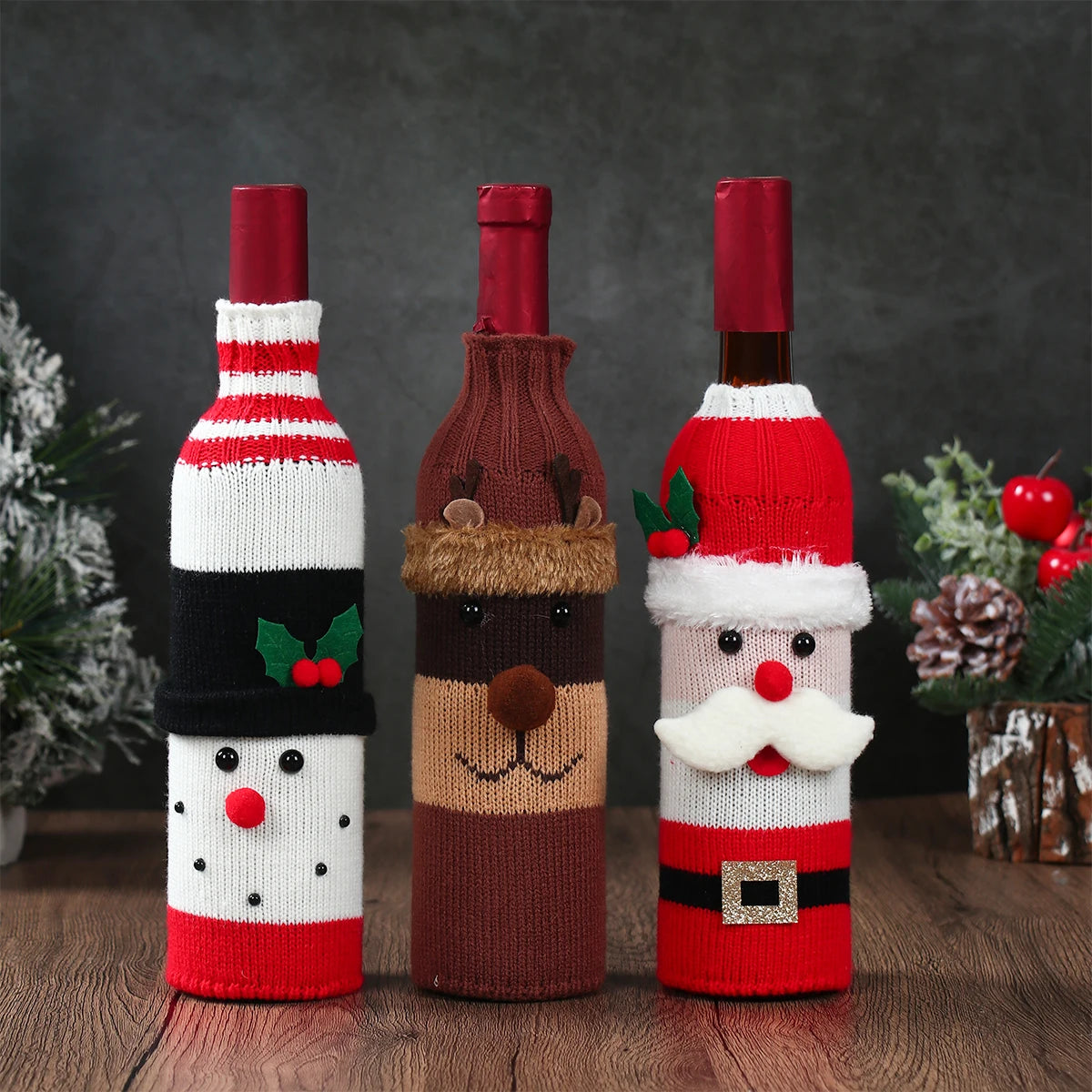 Christmas wine bottle covers set featuring Santa, a snowman, and a reindeer for festive holiday decor