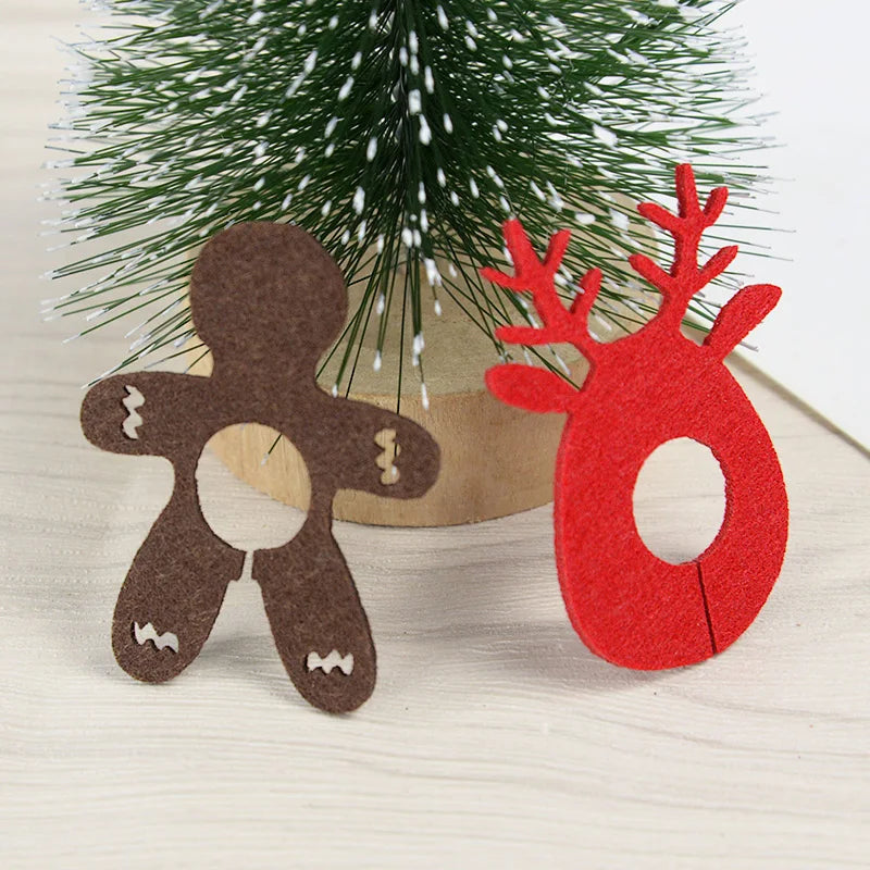 Christmas wine glass charms set featuring gingerbread man and reindeer designs for festive gatherings