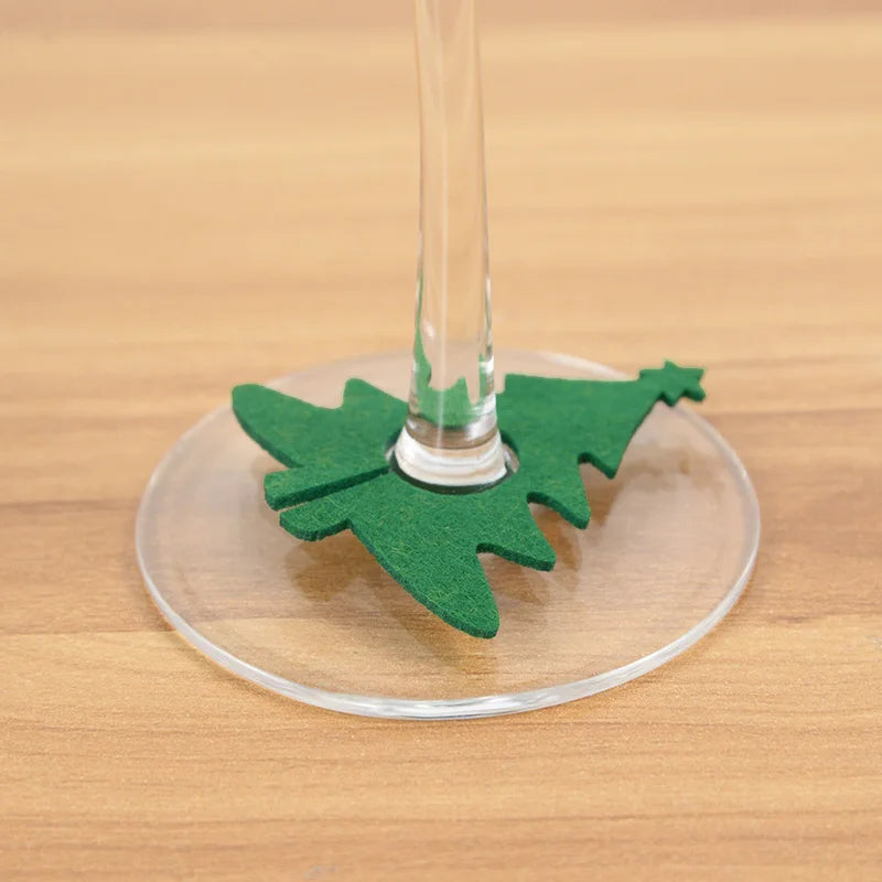 Christmas wine glass charms set featuring green felt tree designs for festive gatherings
