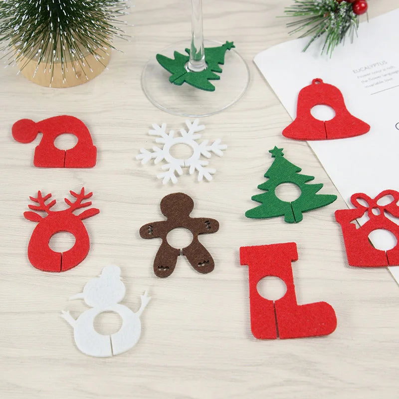 Christmas wine glass charms set with festive designs like Santa, reindeer, and snowflakes in vibrant colors