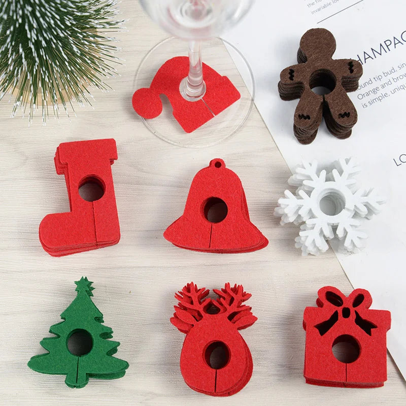 Christmas wine glass charms set featuring festive designs like a tree, snowflake, and gingerbread man