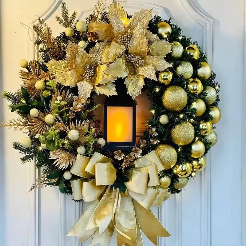 Elegant Christmas Wreath with Golden Ornaments, Poinsettias, and a Lantern Centerpiece