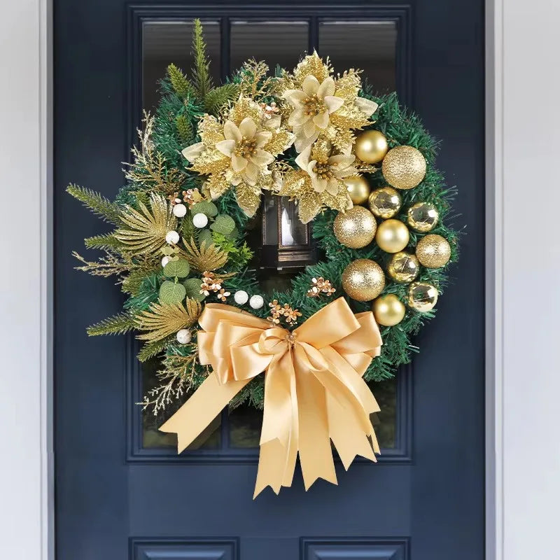 Elegant Christmas Wreath With Lantern featuring gold ornaments and a large bow for festive decoration