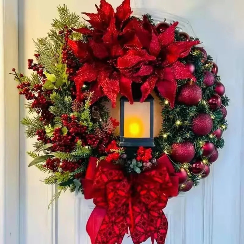 Festive Christmas Wreath With Lantern Featuring Red Poinsettias and Shiny Ornaments
