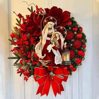 Festive Christmas Wreath With Lantern Featuring Red Flowers and a Holy Family Figurine
