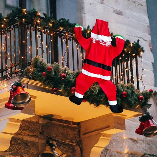 Nutshell Climbing Santa Claus decoration hanging from a balcony with festive lights and ornaments