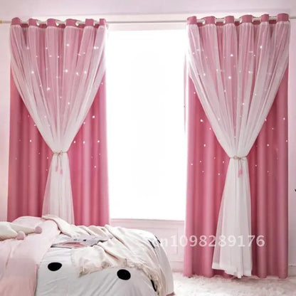 Nutshell Double Layer Sheer Star Curtains in pink with white star sheers and blackout panels tied back