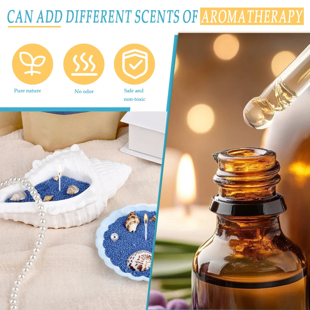 Nutshell candles with blue colored candle sand and aromatherapy essential oil dropper nearby