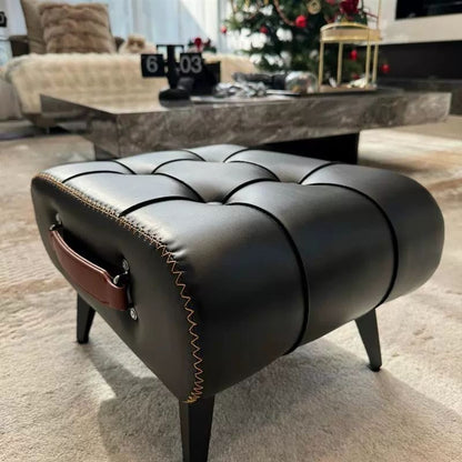 Nutshell comfortable faux leather footrest with stylish tufted design and sturdy legs