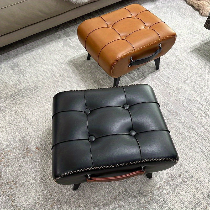 Two Nutshell ottomans featuring a comfortable faux leather footrest in black and tan colors