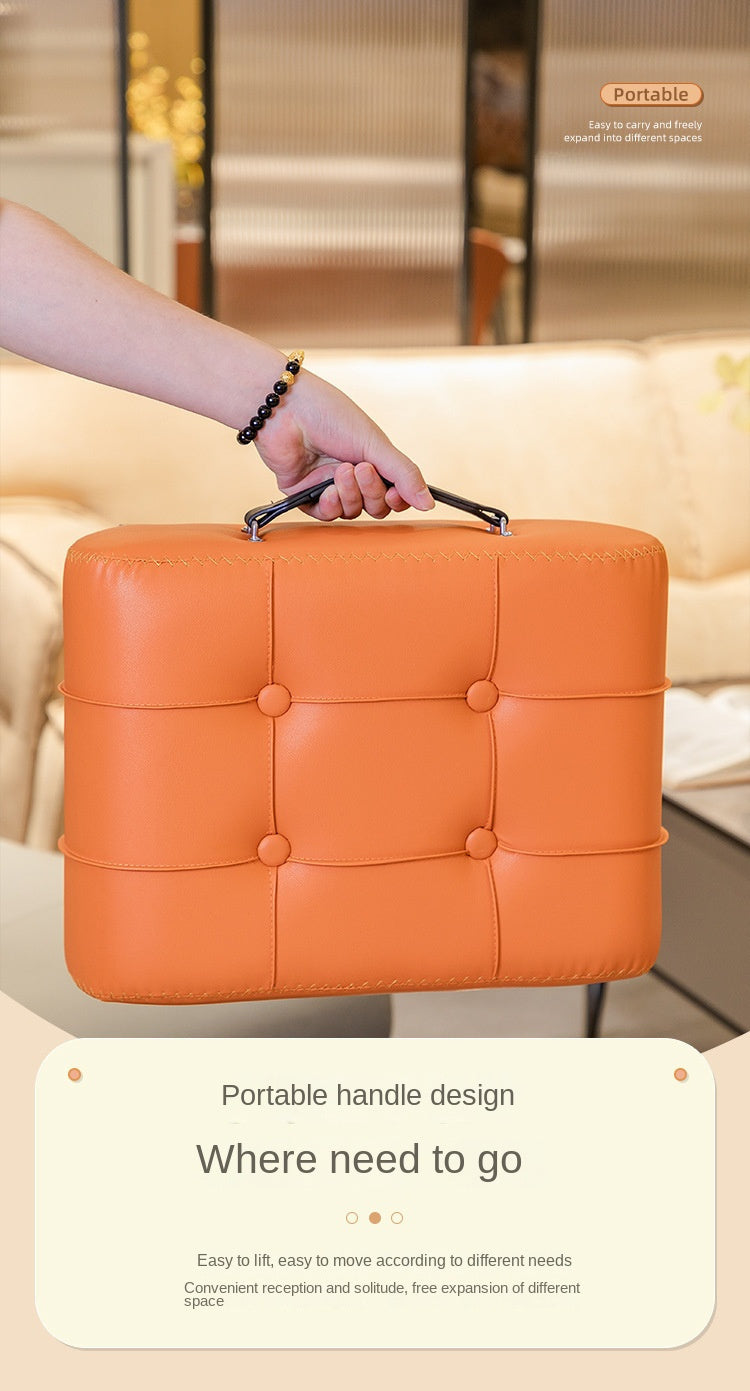Nutshell comfortable faux leather footrest with portable handle design for easy mobility