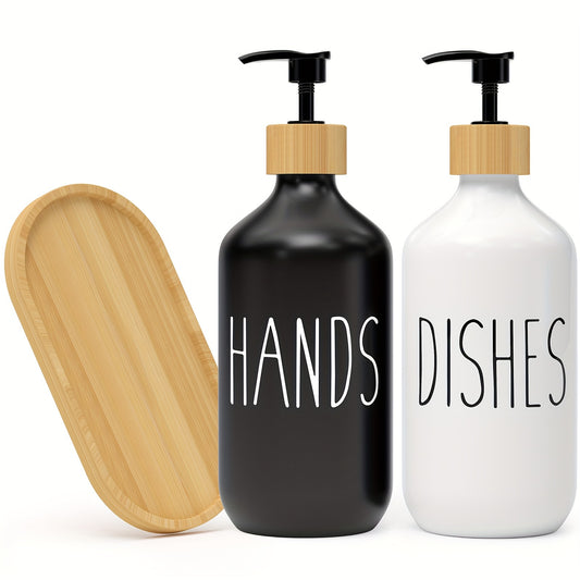 Modern countertop soap dispenser set featuring black and white bottles with bamboo pumps and matching tray