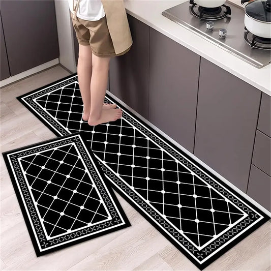 Nutshell black and white geometric runner and small mat by stove with barefoot person Anti Slip Kitchen Floor Mat