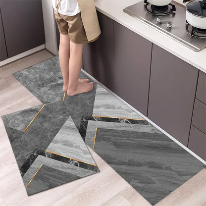 Nutshell Anti Slip Kitchen Floor Mat set gray marble geometric design with gold accent lines by stove