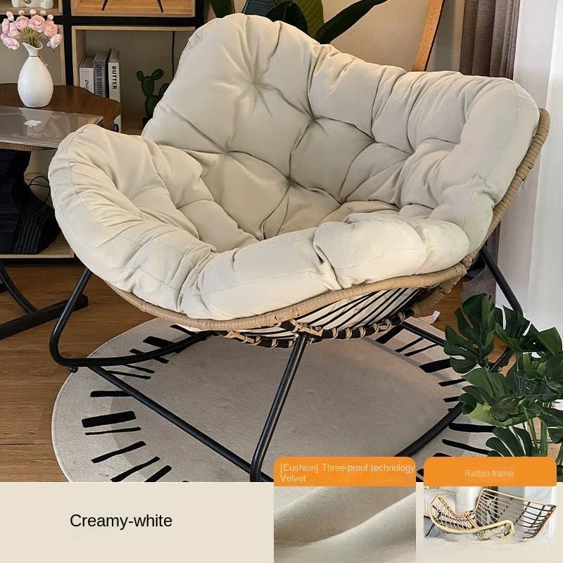 Nutshell lazy leisure rocking chair with cushion cream tufted velvet cushion rattan frame and black metal rockers