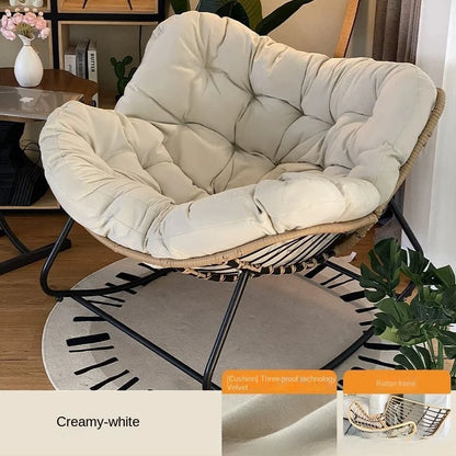 Nutshell lazy leisure rocking chair with cushion cream tufted velvet cushion rattan frame and black metal rockers
