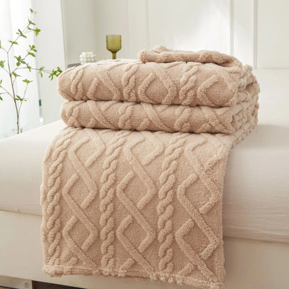 Nutshell beige plush cable knit warm sofa throw blanket folded on sofa for cozy living room