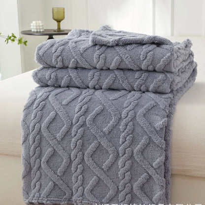 Nutshell gray cable knit textured plush warm sofa throw blanket folded on bed for cozy decor