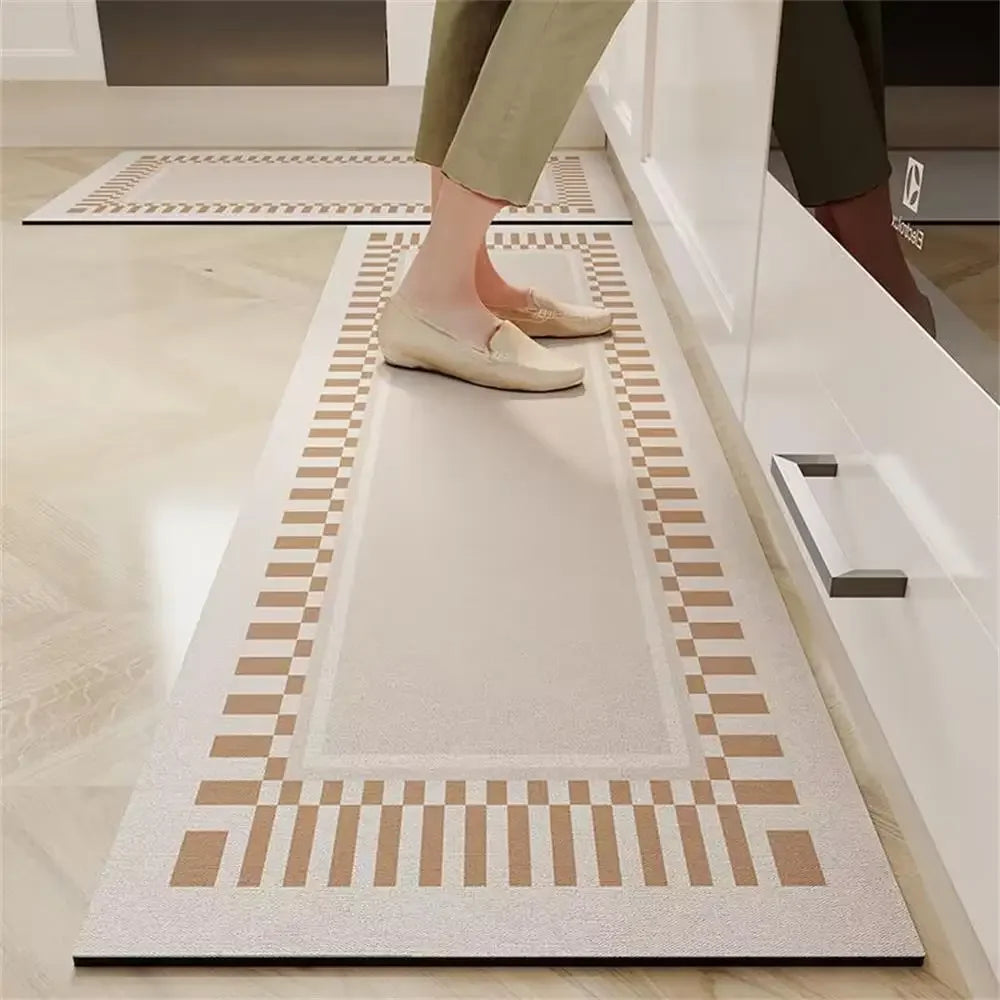Nutshell anti slip kitchen floor mat beige patterned long runner in front of cabinets with person standing