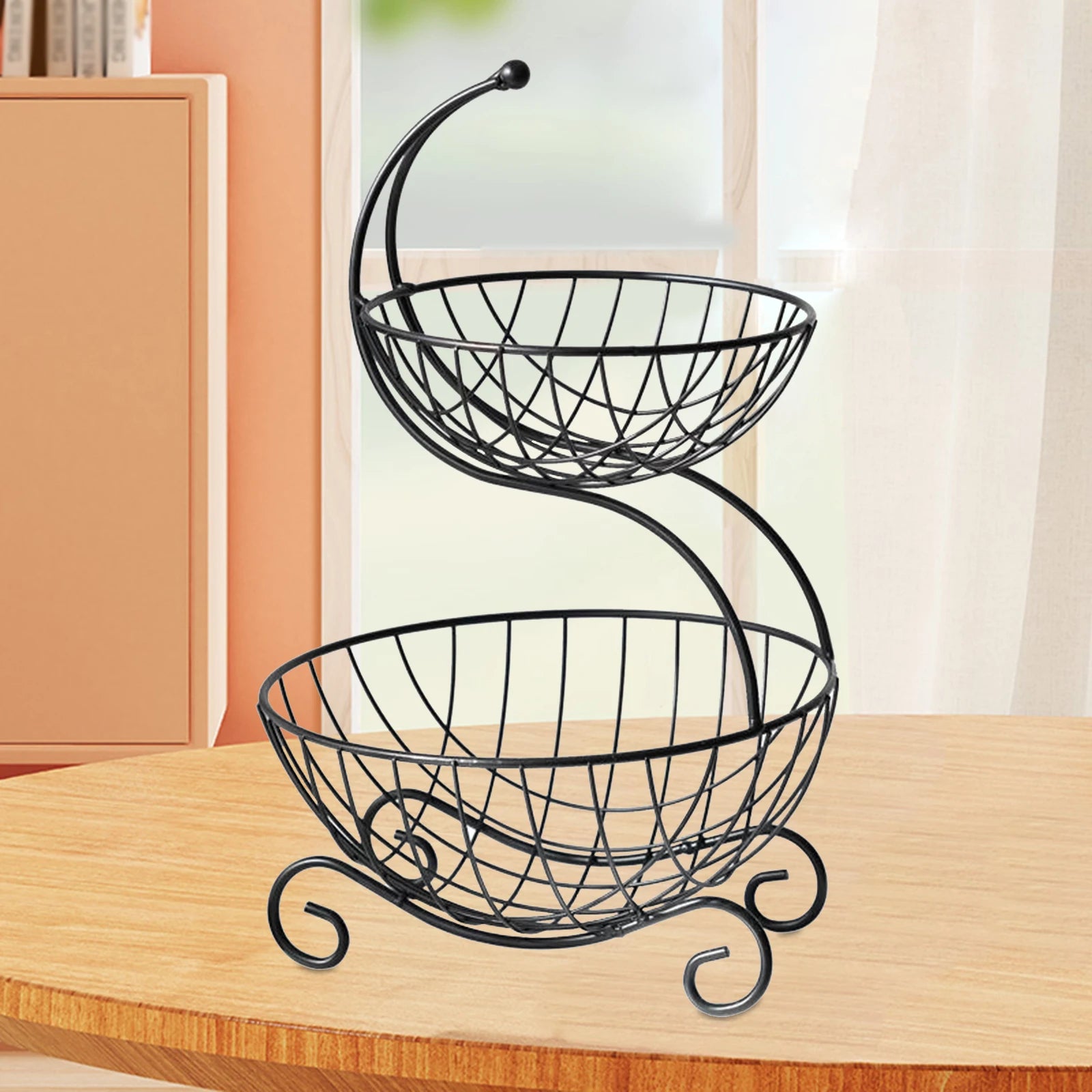 Nutshell decorative fruit storage rack with two-tier black wire baskets on wooden table