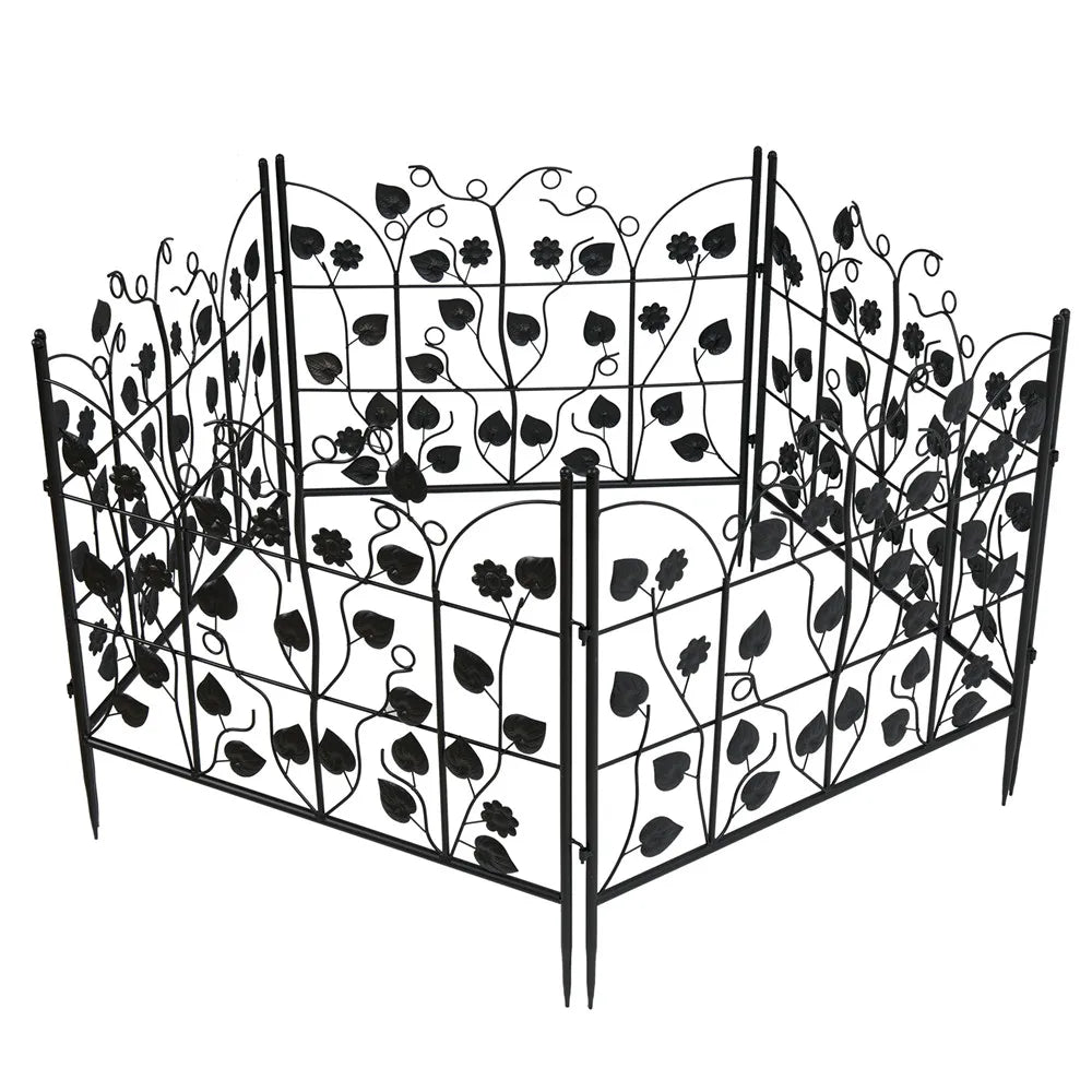 Black metal decorative garden fence panels with floral and leaf design by Nutshell